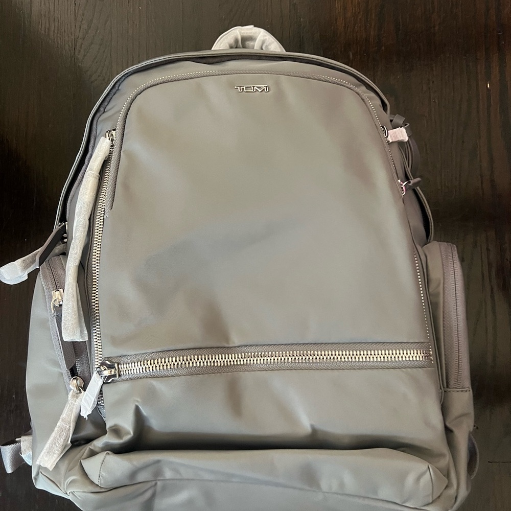Tumi Gray Backpack with Minimalist Design and Durable Fabric